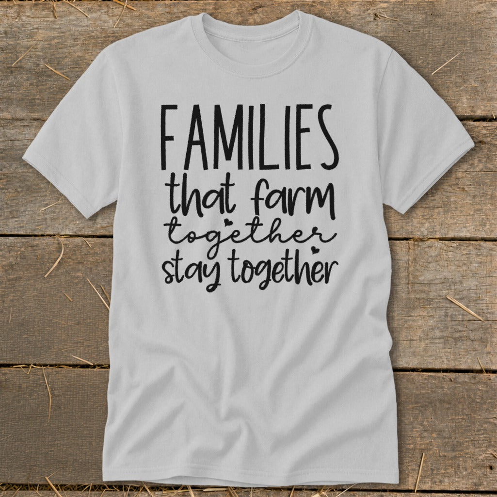 Light grey t-shirt with black text "Families that farm together stay together".