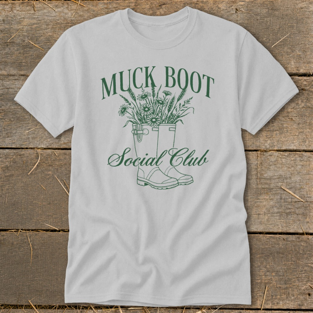 Muck Boot Social Club graphic on a light gray t-shirt.