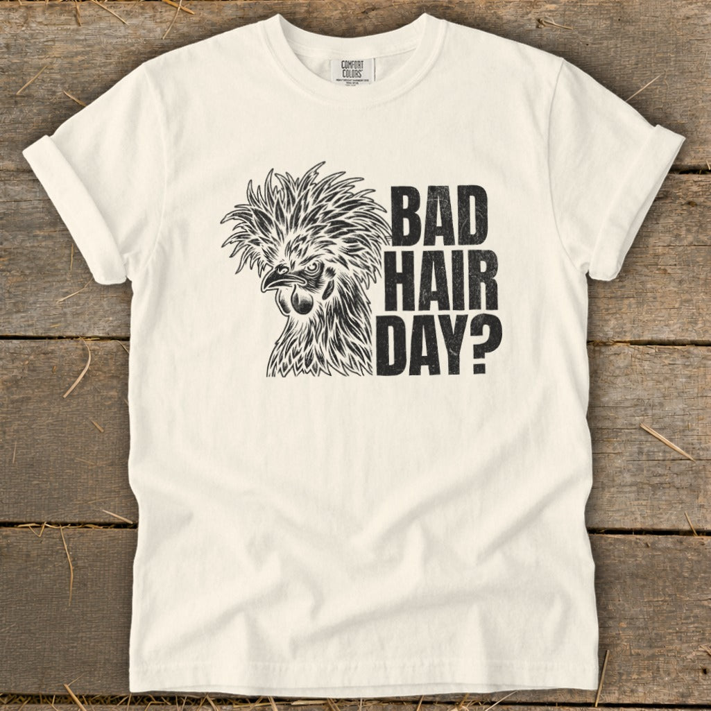 Cream t-shirt with a chicken graphic and "BAD HAIR DAY?" text.