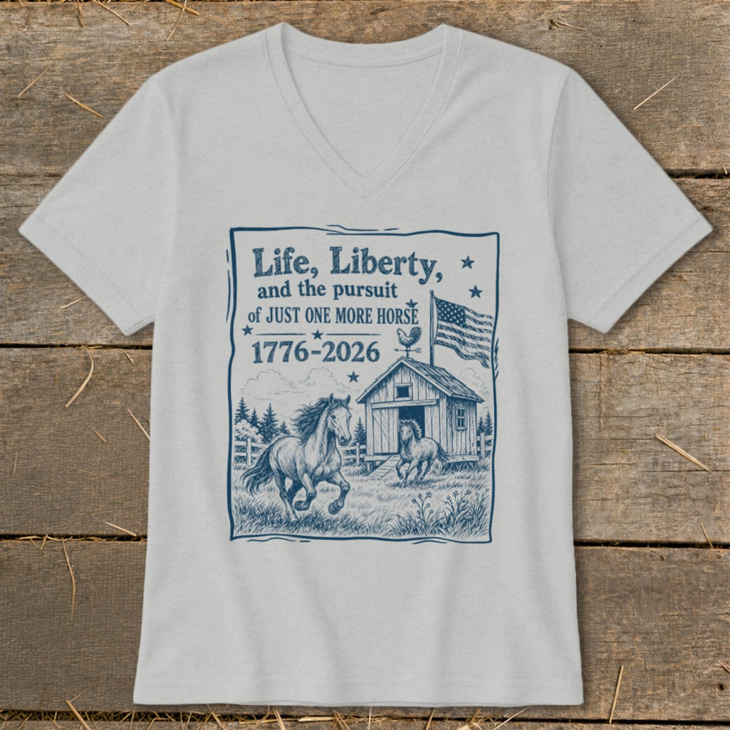 Light grey v-neck t-shirt with navy blue graphic of horses, barn, American flag and text.