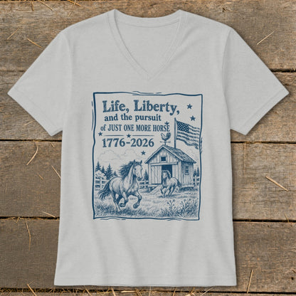 Light grey v-neck t-shirt with navy blue graphic of horses, barn, American flag and text.