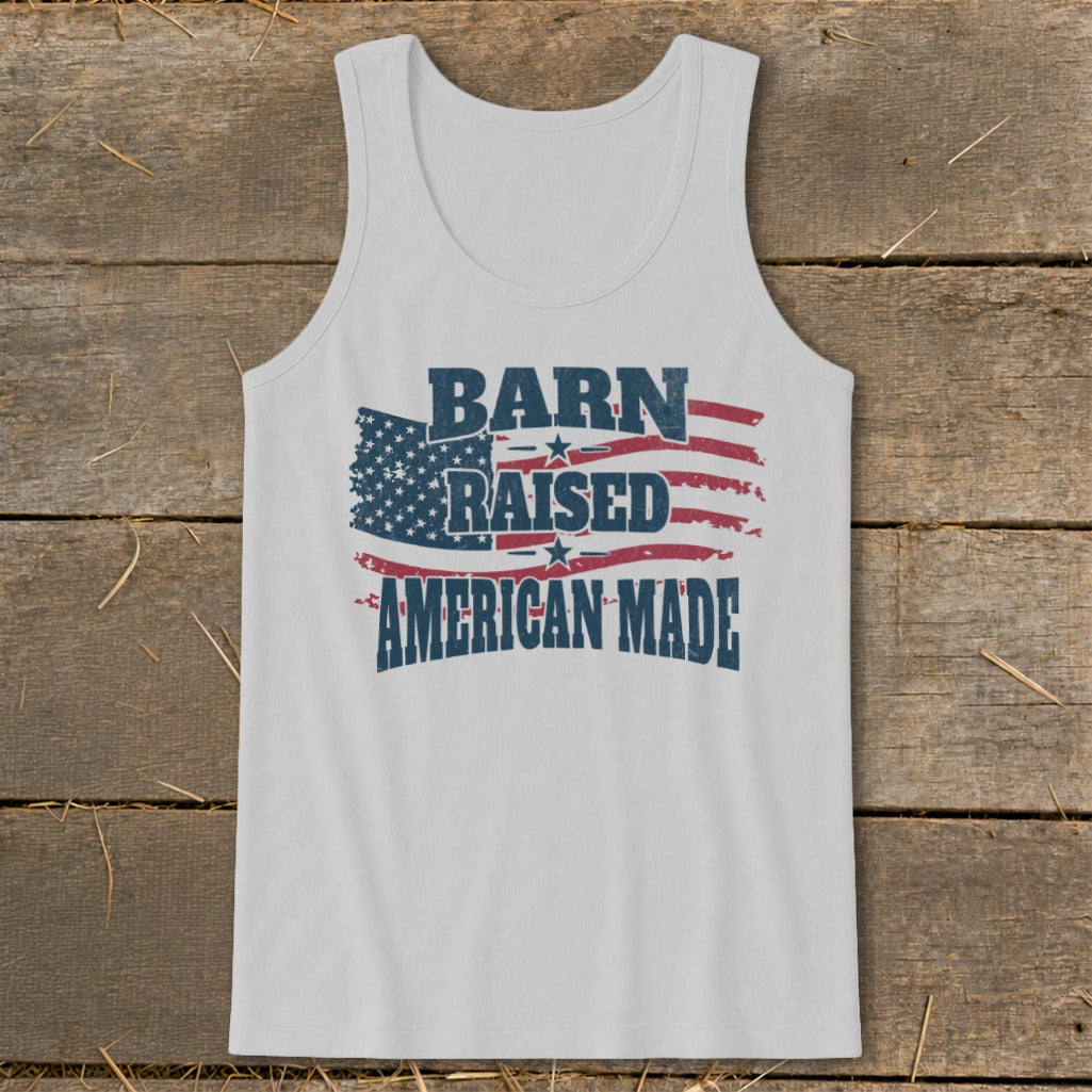 White tank top with "Barn Raised American Made" text and American flag graphic.
