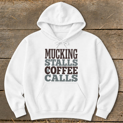 White hoodie with "MUCKING STALLS & COFFEE CALLS" text printed on front.