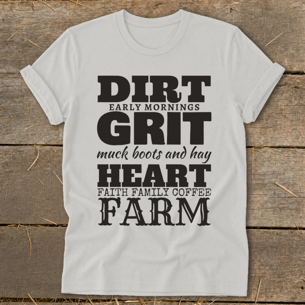 White t-shirt with "DIRT EARLY MORNINGS GRIT muck boots and hay HEART FAITH FAMILY COFFEE FARM" text.