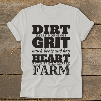 White t-shirt with "DIRT EARLY MORNINGS GRIT muck boots and hay HEART FAITH FAMILY COFFEE FARM" text.