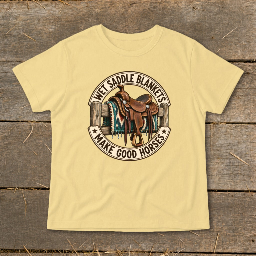 Yellow t-shirt with a western-style graphic of a saddle and blanket.