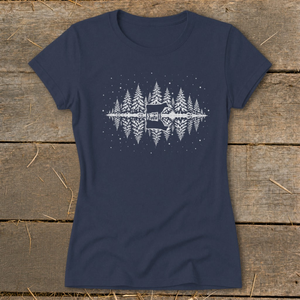 Navy t-shirt with white graphic of pine trees, a cow, and reflection.