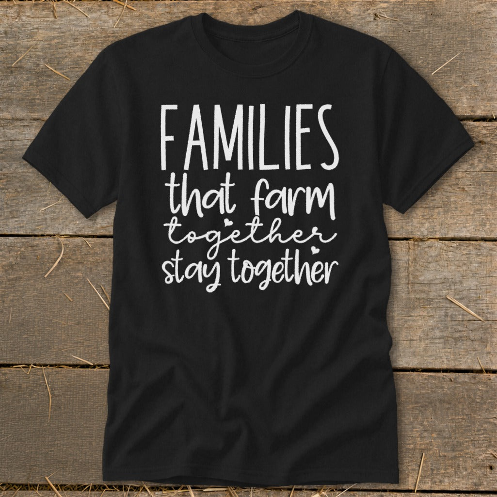 Black t-shirt with white text "FAMILIES that farm together stay together".