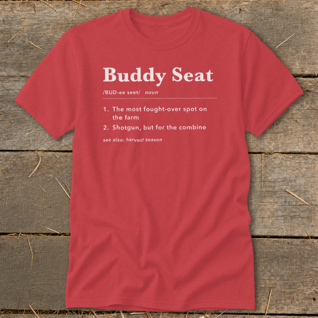 Red t-shirt with "Buddy Seat" definition: fought-over spot, shotgun for combine.