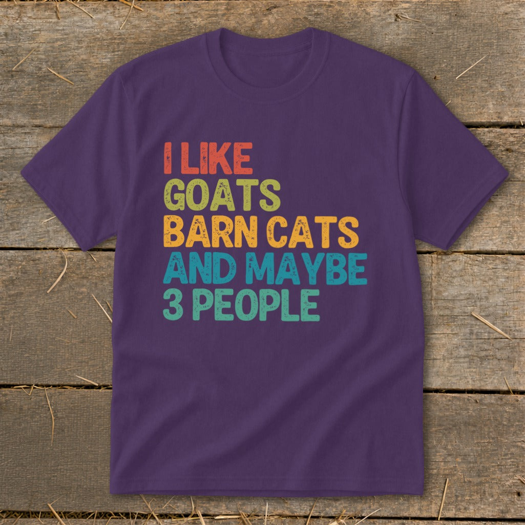 Purple t-shirt with text "I like goats barn cats and maybe 3 people".