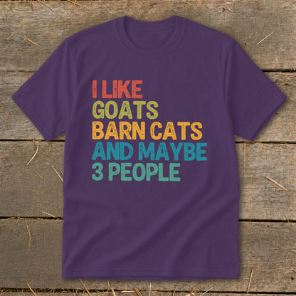 Purple t-shirt with text "I like goats barn cats and maybe 3 people".