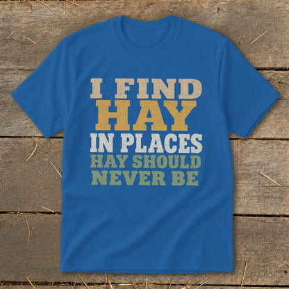Blue t-shirt with "I FIND HAY IN PLACES HAY SHOULD NEVER BE" text.