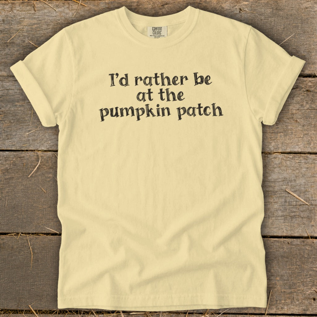 Yellow t-shirt with black text that reads "I'd rather be at the pumpkin patch".