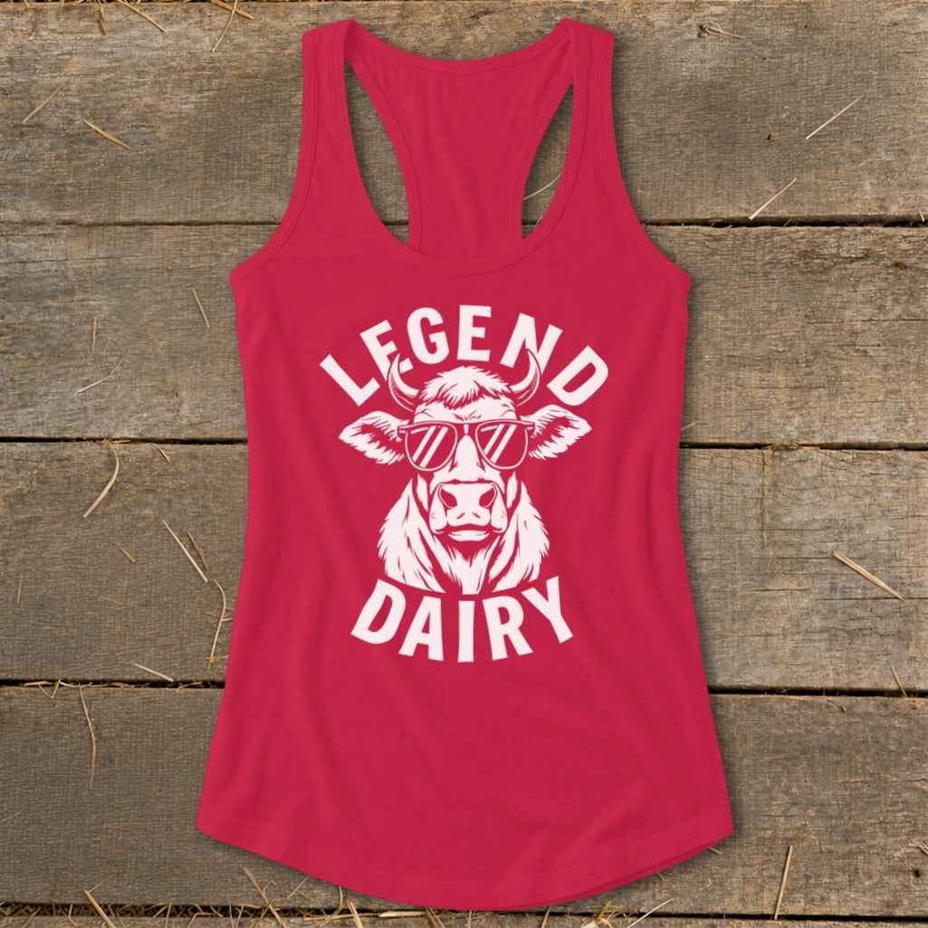 Red tank top with white graphic of a cow wearing sunglasses and text "LEGEND DAIRY".