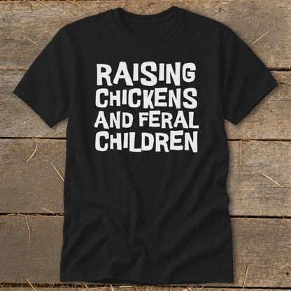 Black t-shirt with white text: Raising Chickens and Feral Children.
