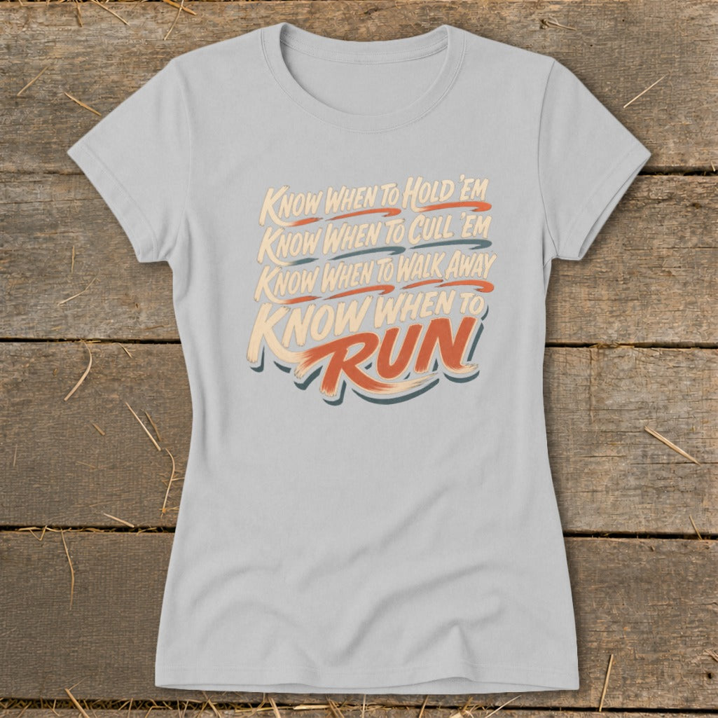 Light gray t-shirt with text: "Know when to hold 'em, know when to cull 'em, know when to walk away, know when to RUN!"