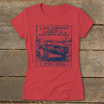 Red t-shirt with graphic: "Life, Liberty, and the Pursuit of a Good Nap in the Truck."