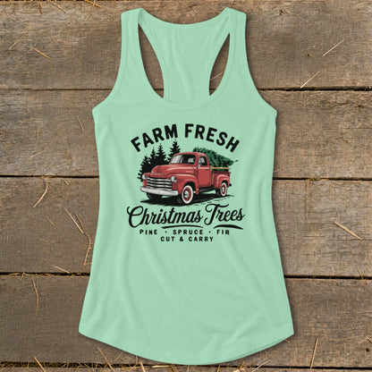 Farm Fresh Christmas Trees with red truck and pine, spruce, fir text.