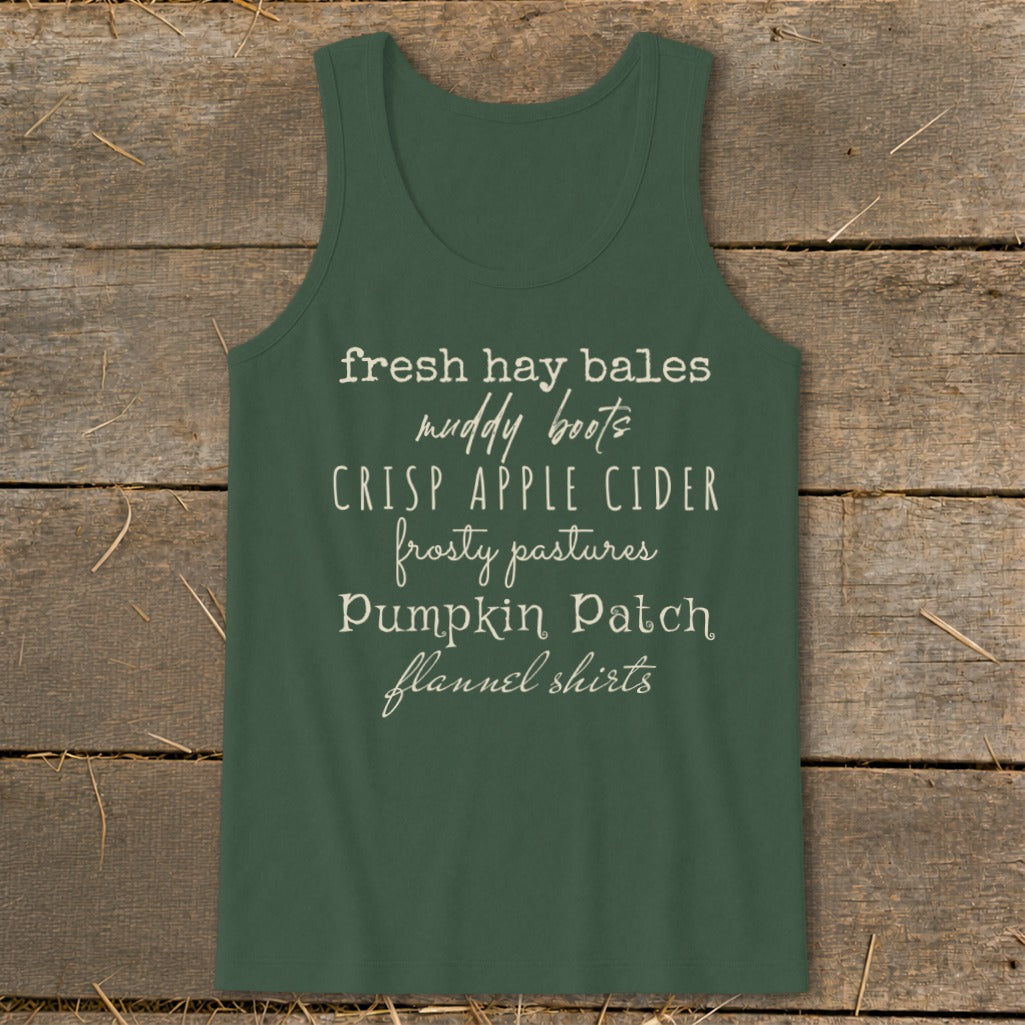Green tank top with white text listing fall activities.
