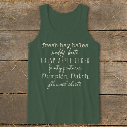 Green tank top with white text listing fall activities.