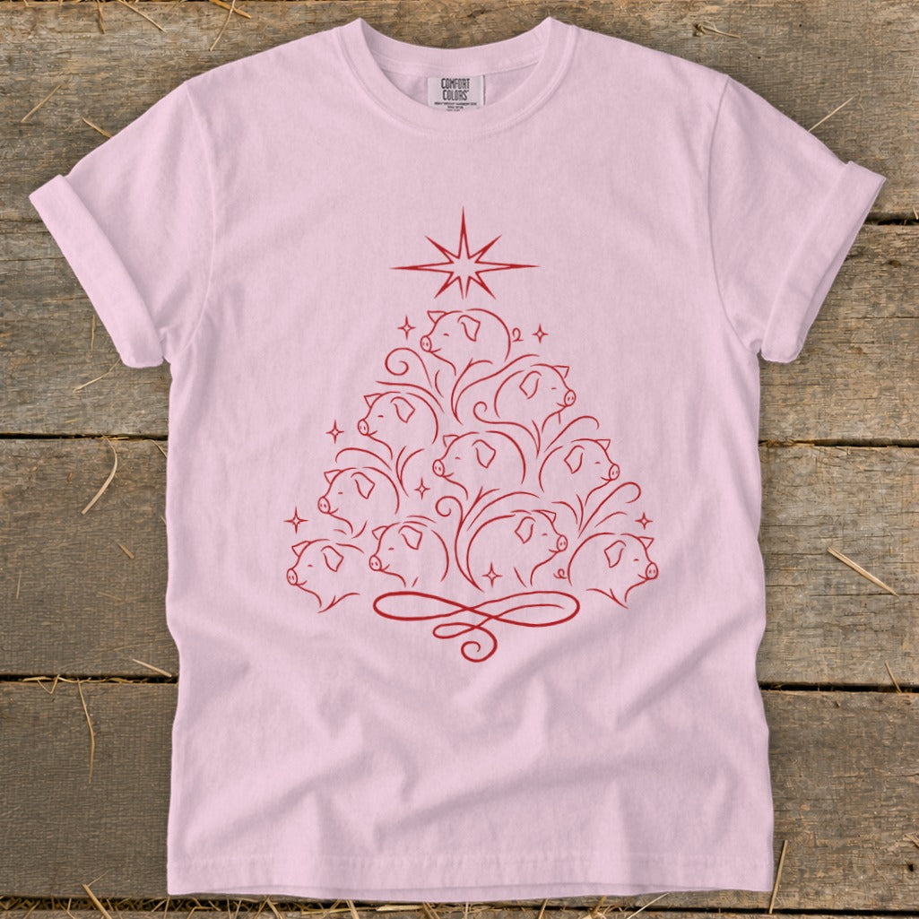 Pink t-shirt with a red outline of a Christmas tree made of pigs.