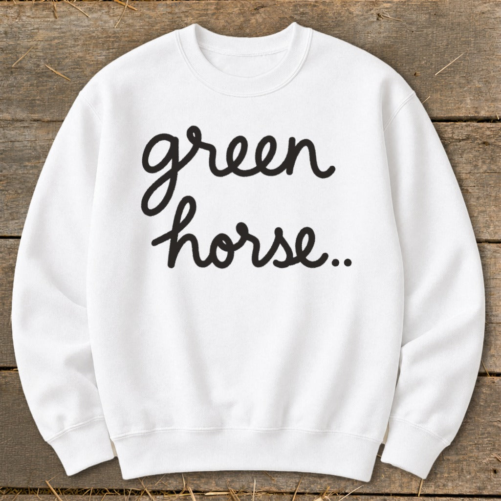 White sweatshirt with "green horse.." text in black cursive lettering.