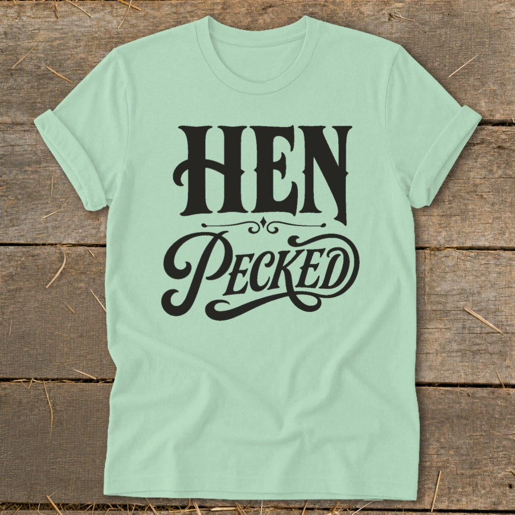 Light mint green t-shirt with black text reading "HEN PECKED".