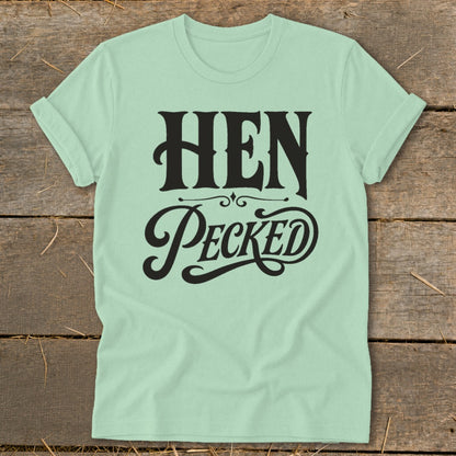 Light mint green t-shirt with black text reading "HEN PECKED".