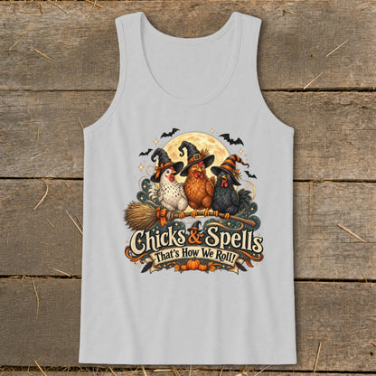 Three witches' hats wearing chickens fly on a broomstick with text "Chicks & Spells".