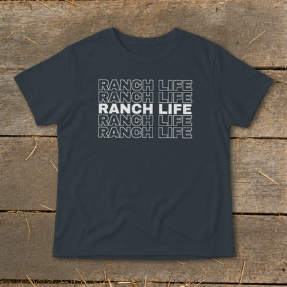 A dark gray t-shirt with the words RANCH LIFE printed in stacked, outlined white lettering across the chest.