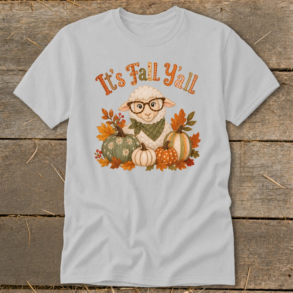Sheep with glasses and scarf surrounded by pumpkins and fall leaves, says "It's Fall Y'all".