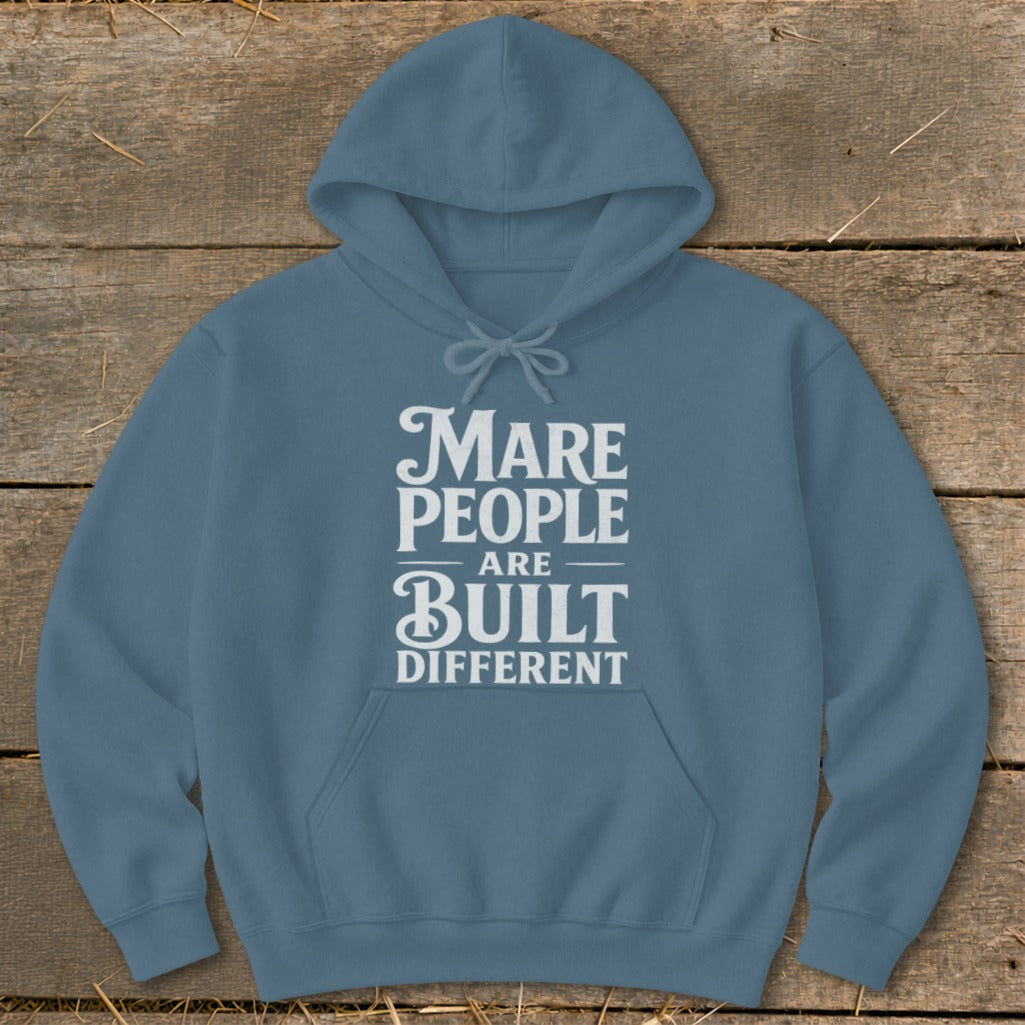 Blue hoodie with white text: "Mare people are built different".