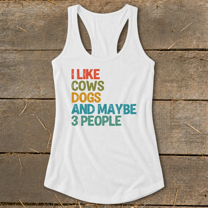 White tank top with "I like cows dogs and maybe 3 people" text.