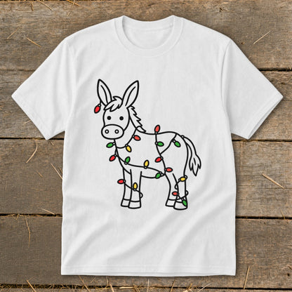 White t-shirt with a black outline drawing of a donkey covered in colorful Christmas lights.