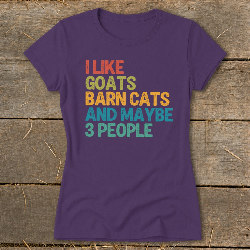 Purple t-shirt with retro text: "I LIKE GOATS BARN CATS AND MAYBE 3 PEOPLE".
