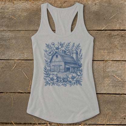 Light gray tank top with a blue barn and floral graphic print.