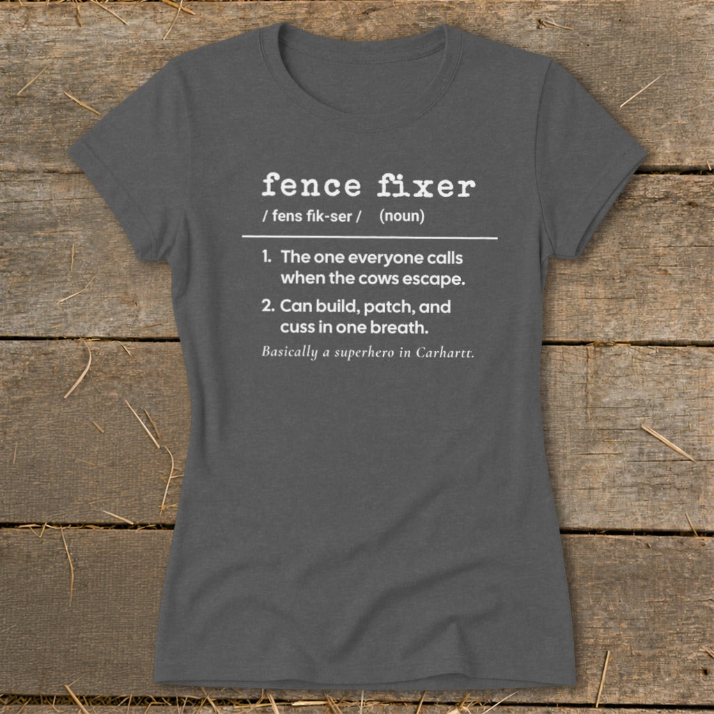 Dark grey t-shirt with "Fence Fixer" definition and humorous description.
