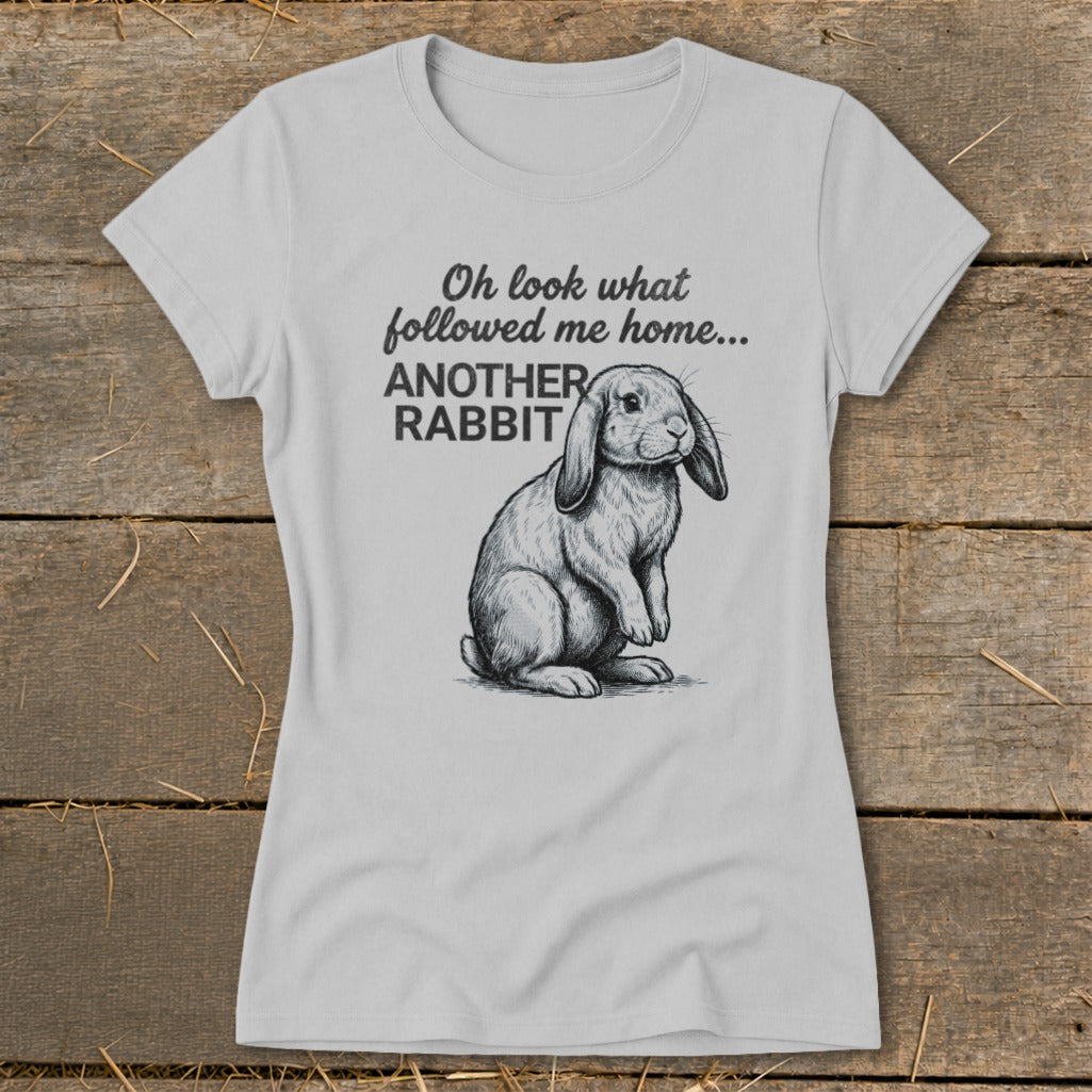Grey t-shirt with sketch of rabbit and text "Oh look what followed me home... ANOTHER RABBIT".
