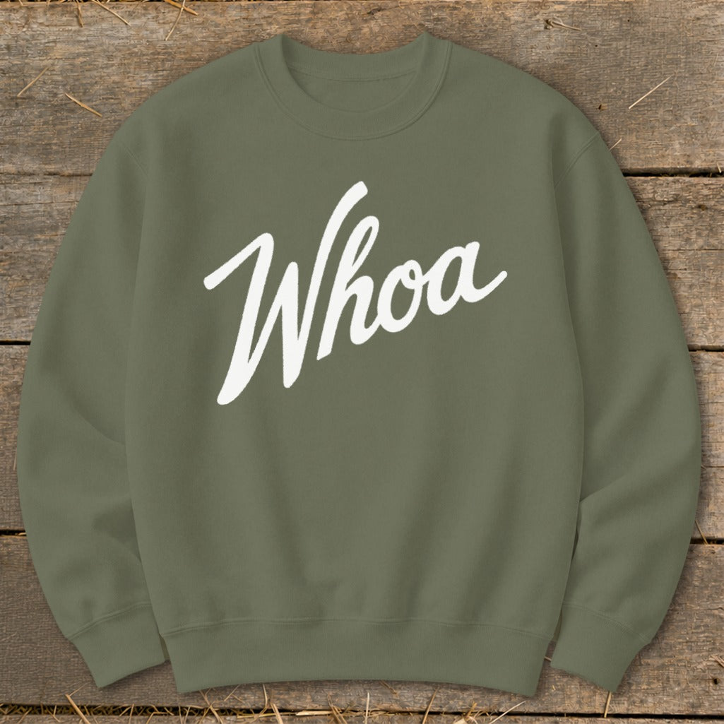Olive green sweatshirt with "Whoa" in white cursive text.