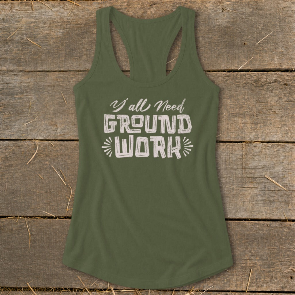 Green tank top with "Y'all Need GROUND WORK" printed in white text.
