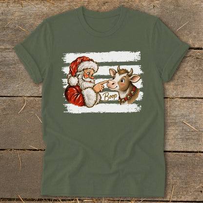 Santa booping a cow on the nose with "Boop" text.