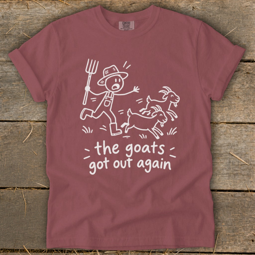 Merlot t-shirt with a stick-figure farmer chasing goats and text "the goats got out again".