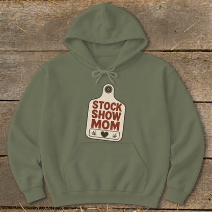 Olive green hoodie with "STOCK SHOW MOM" text on a tag graphic.