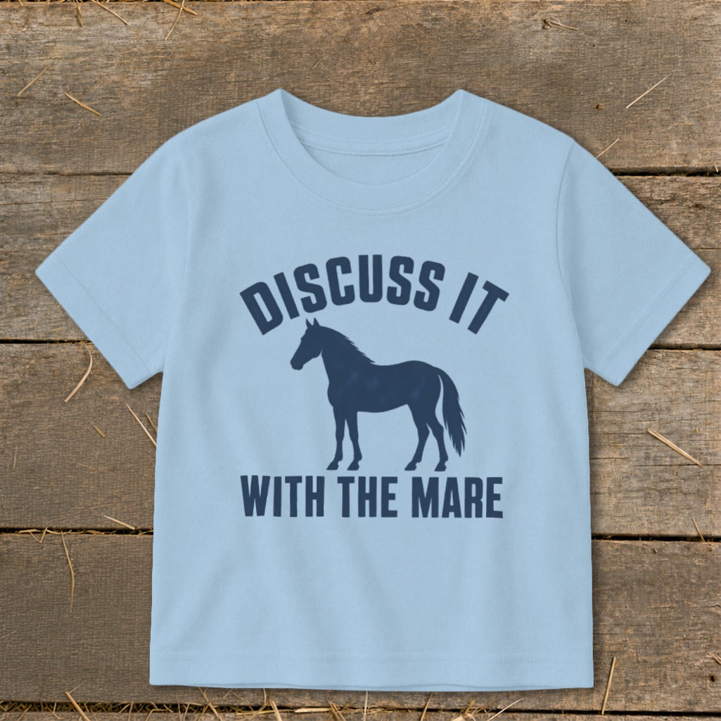 Light blue t-shirt with a navy silhouette of a horse and text "DISCUSS IT WITH THE MARE".