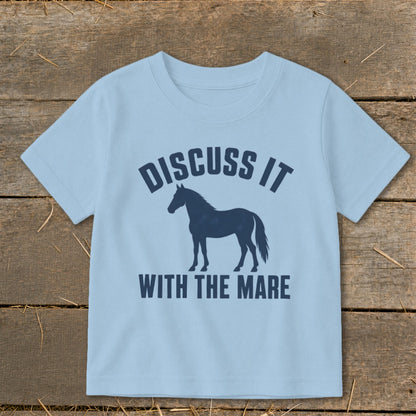Light blue t-shirt with a navy silhouette of a horse and text "DISCUSS IT WITH THE MARE".