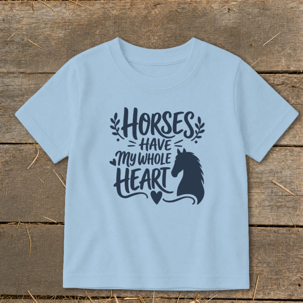 Light blue t-shirt with "Horses Have My Whole Heart" text and horse silhouette.