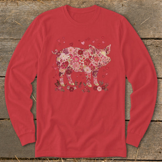 Red long-sleeve shirt with a floral pig design and pink hearts.