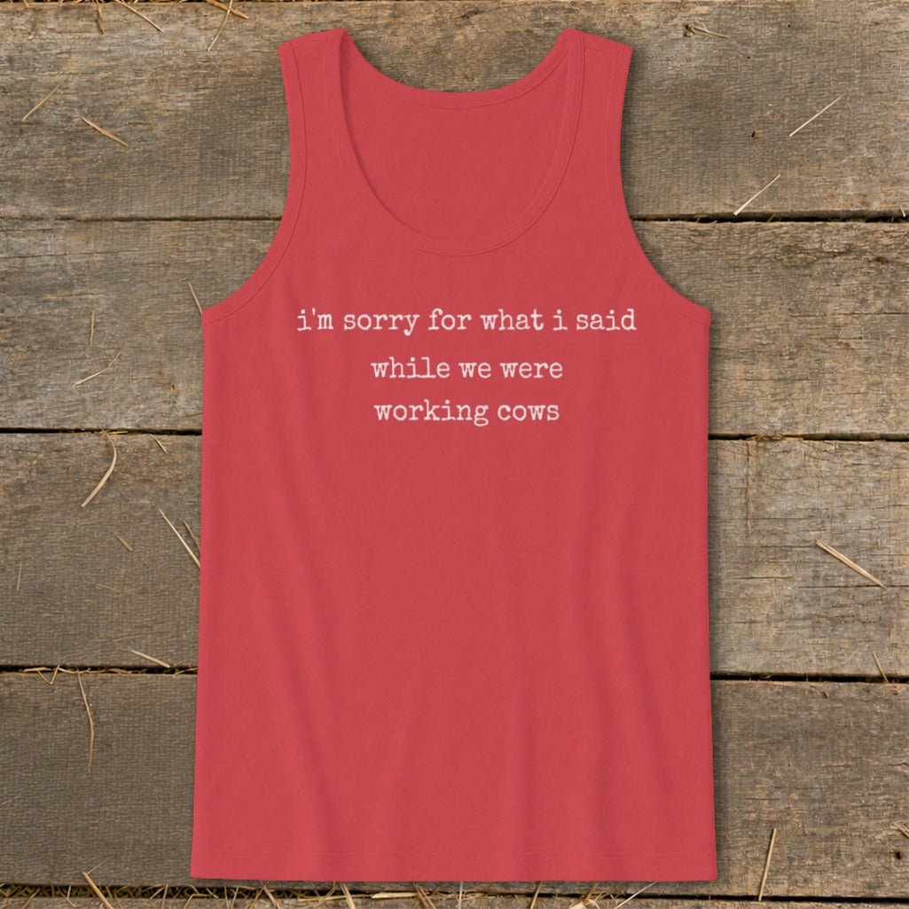 Red tank top with white text: "I'm sorry for what I said while we were working cows."