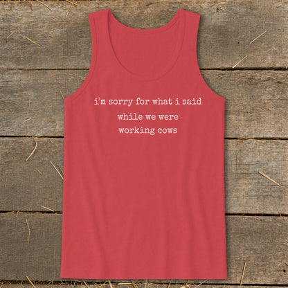 Red tank top with white text: "I'm sorry for what I said while we were working cows."