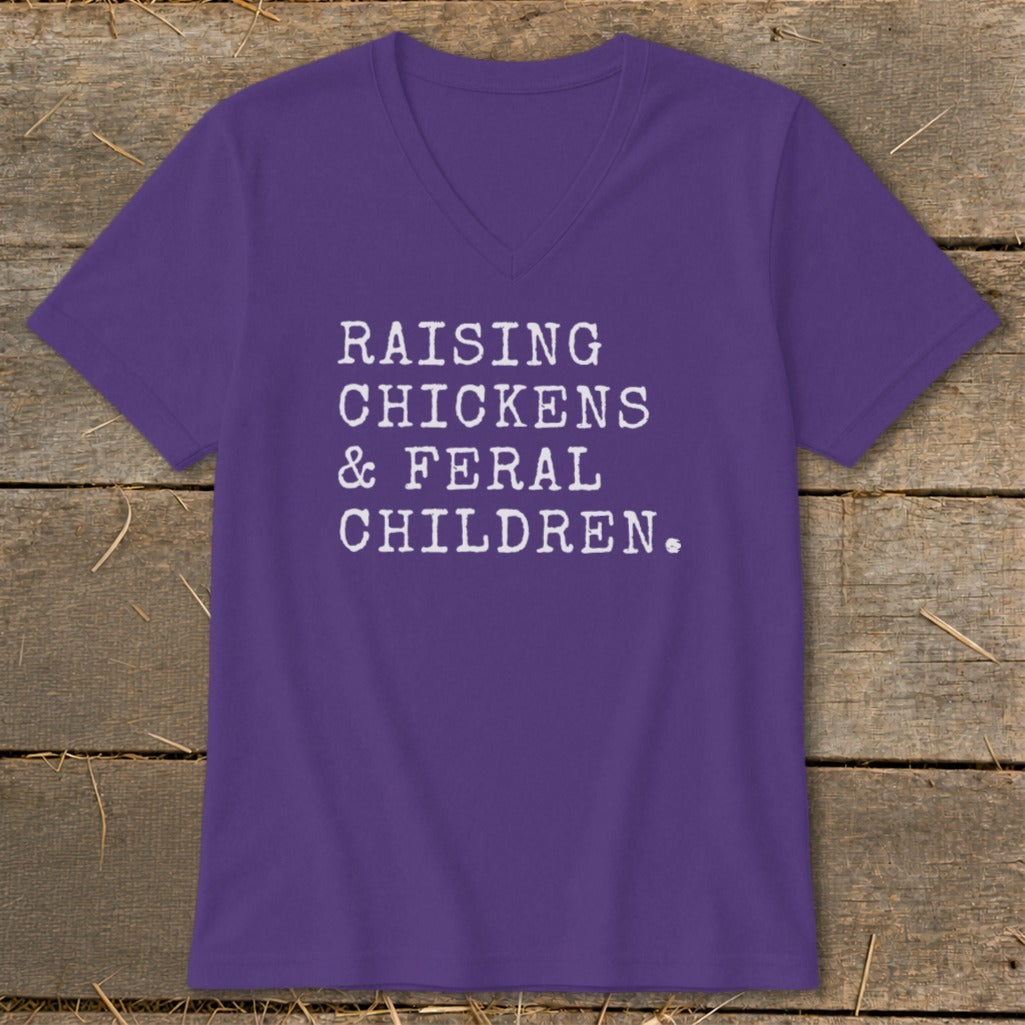 Purple v-neck t-shirt with white text: RAISING CHICKENS & FERAL CHILDREN.